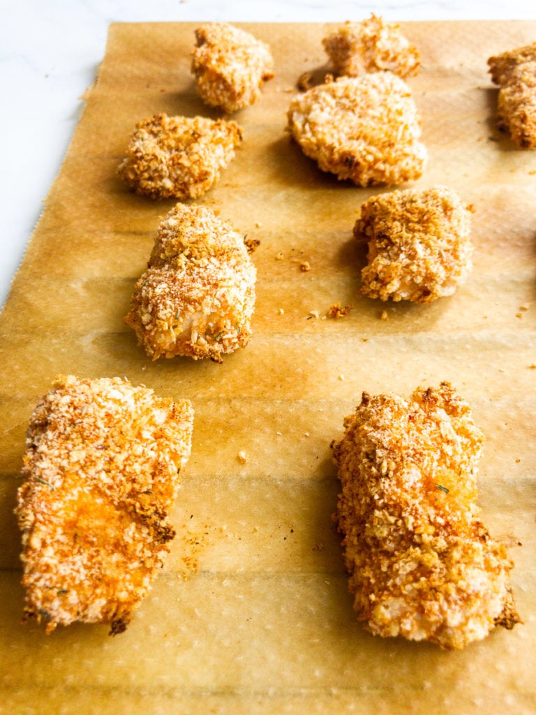 baked chicken nuggets on a baking sheet