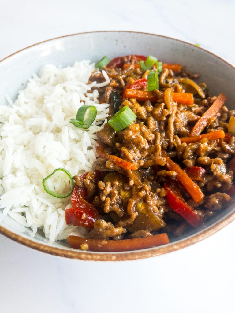 ground beef stir fry with rice in a bowl