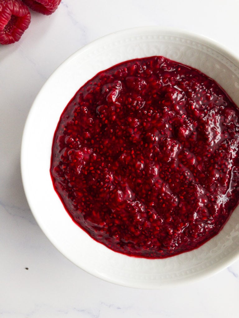 chia seed jam in a white bowl