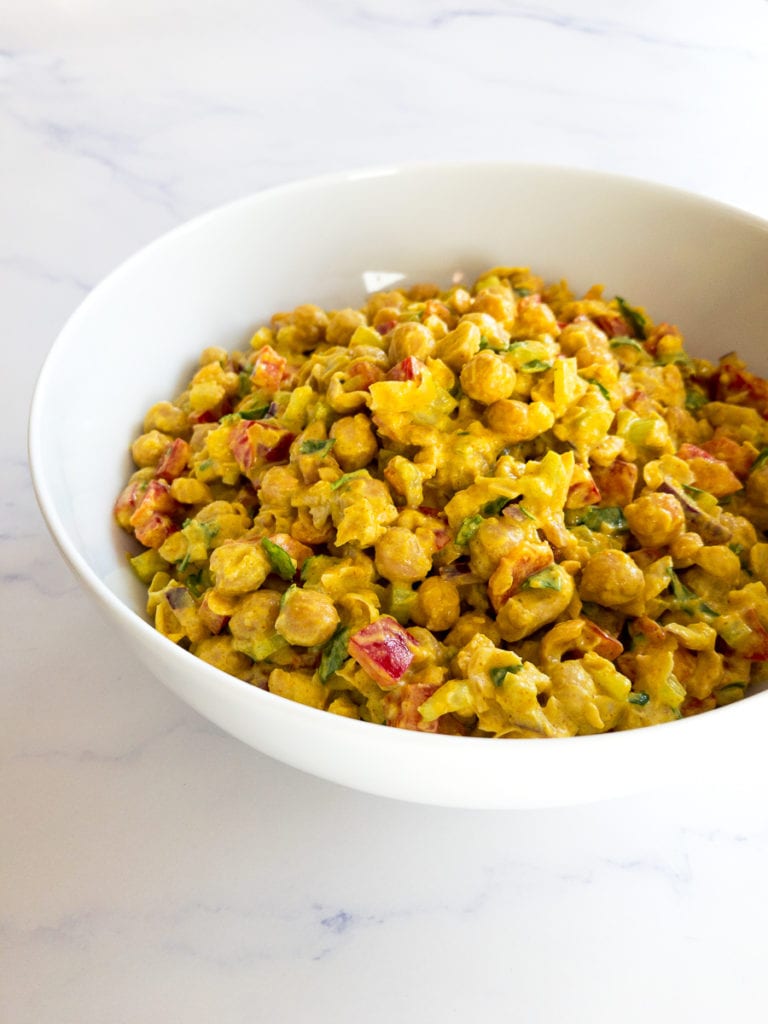 curried chickpea salad in a white bowl