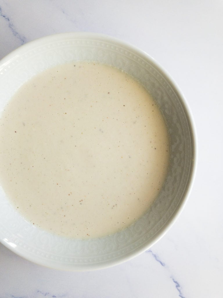 vegan cashew Alfredo sauce in a white bowl