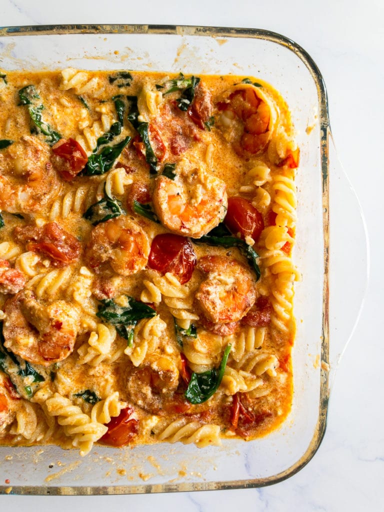 baked feta pasta with shrimp in a baking dish