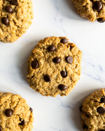 five peanut butter oatmeal chocolate chip cookies on a table