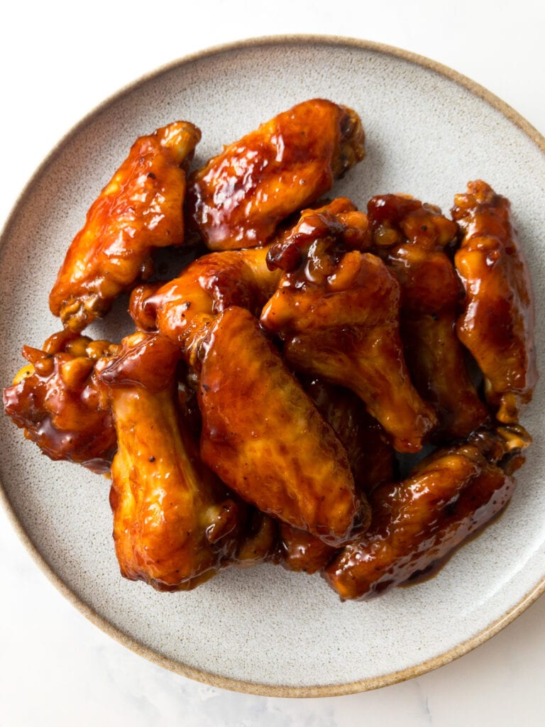 honey sriracha wings on a plate
