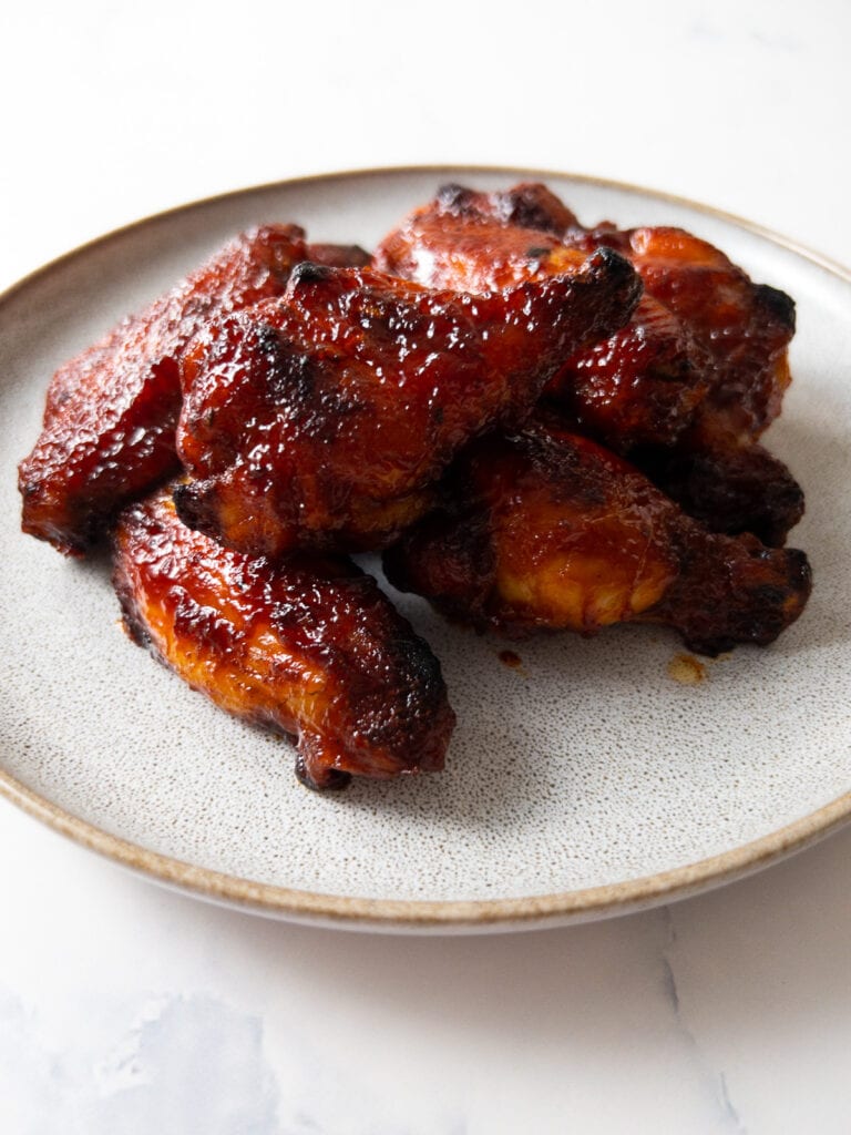 gochujang chicken wings on a plate
