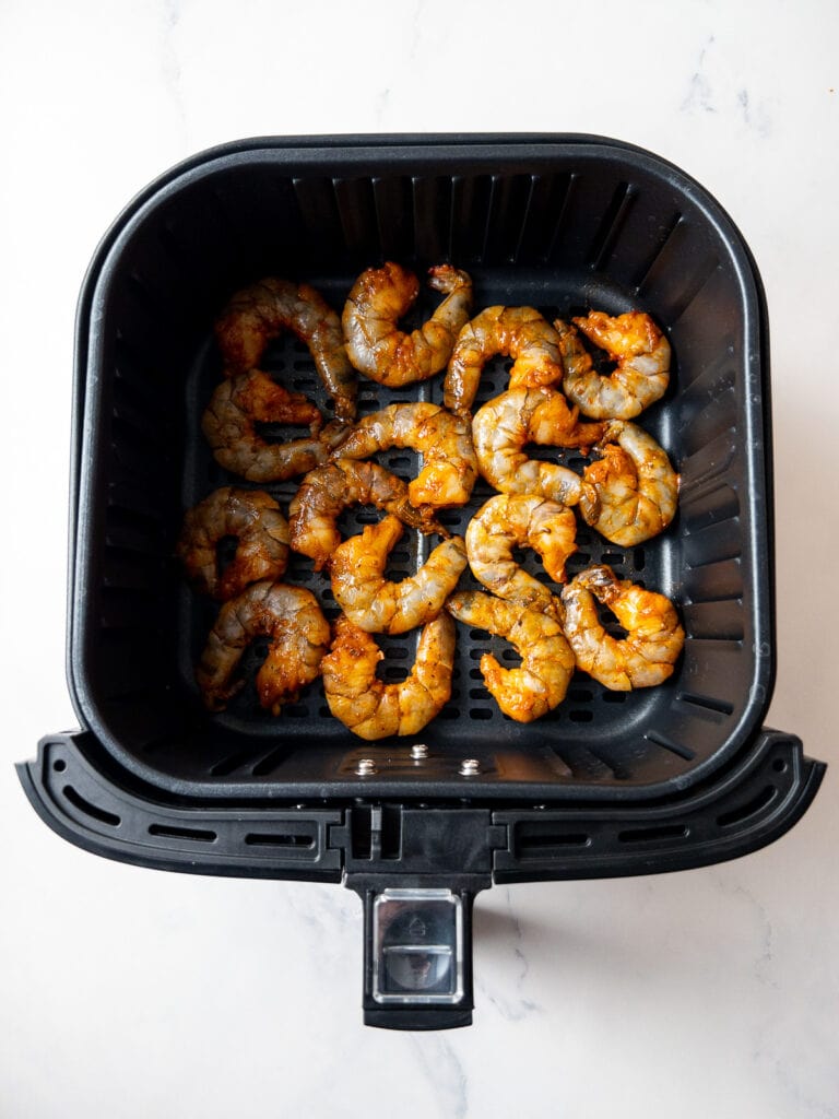 air fryer shrimp before cooking in the air fryer basket