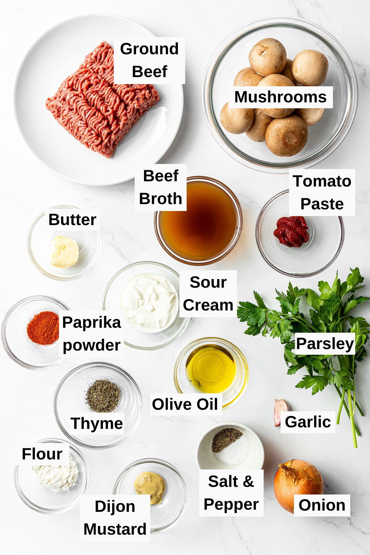 all ingredients for ground beef stroganoff on a table