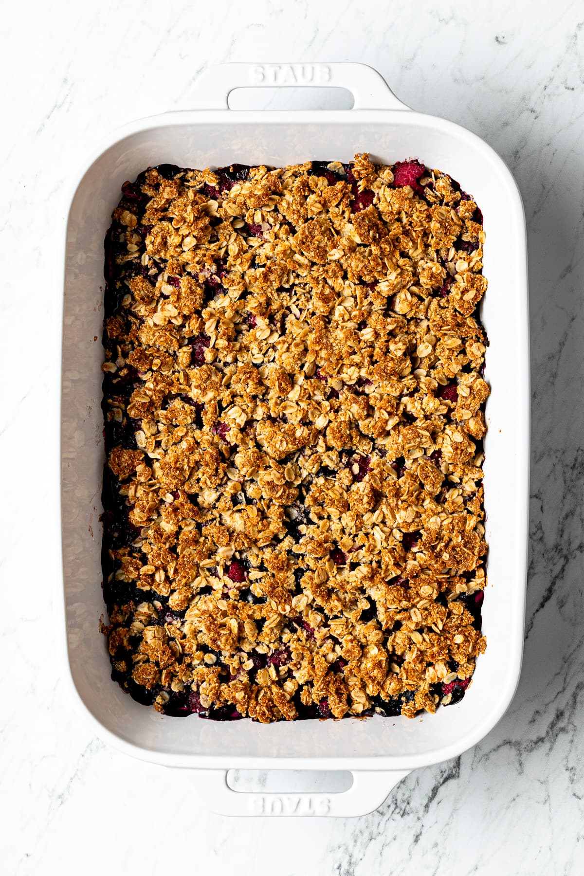 frozen berry crisp in a baking dish