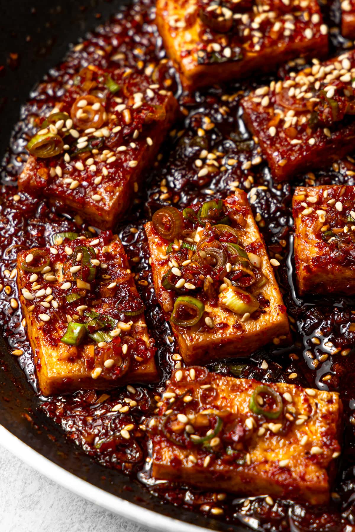 sliced korean braised tofu (dubu jorim) in a pan
