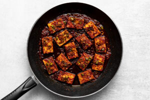 korean braised tofu slices (dubu jorim) in a pan