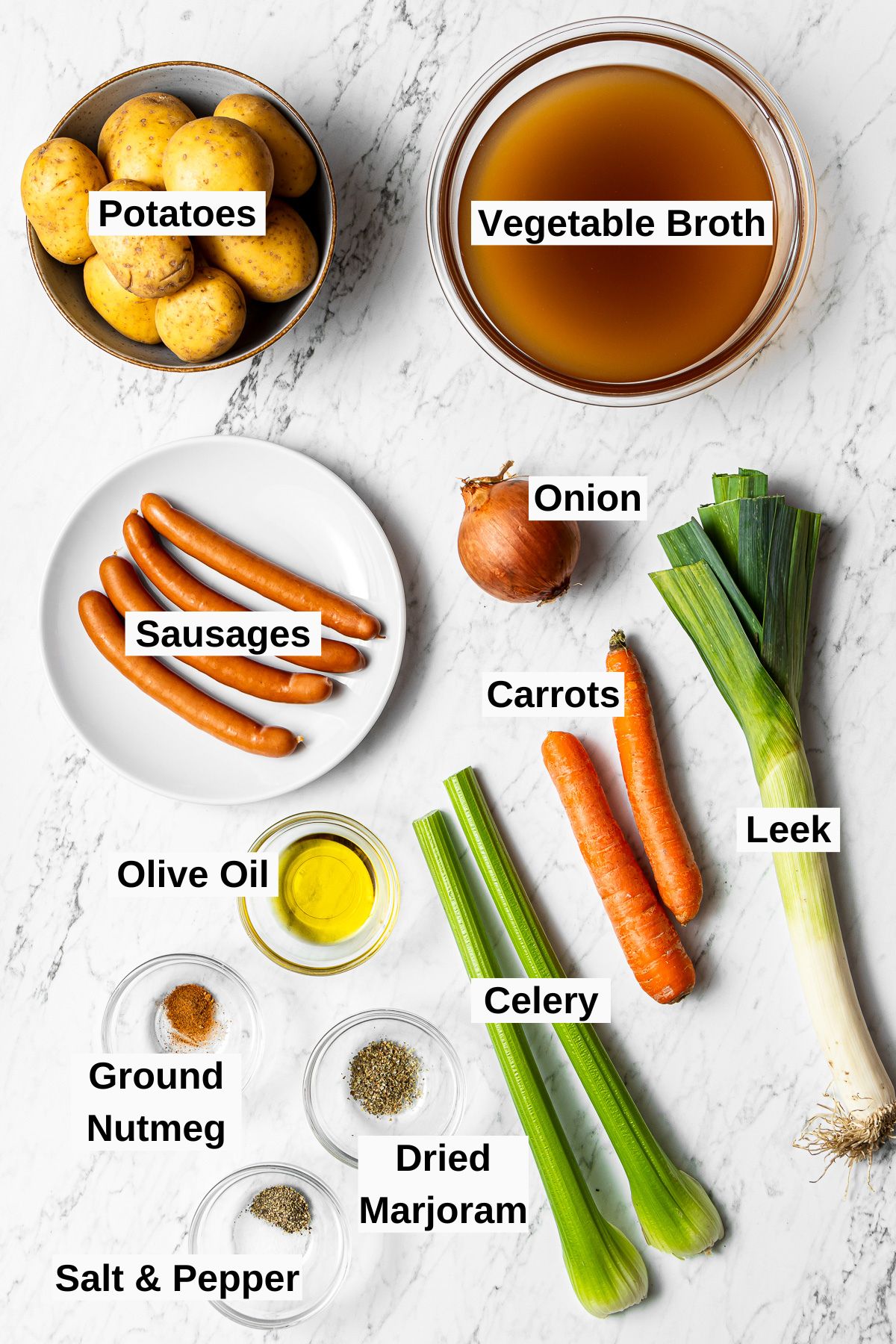 all ingredients for german potato soup on a table