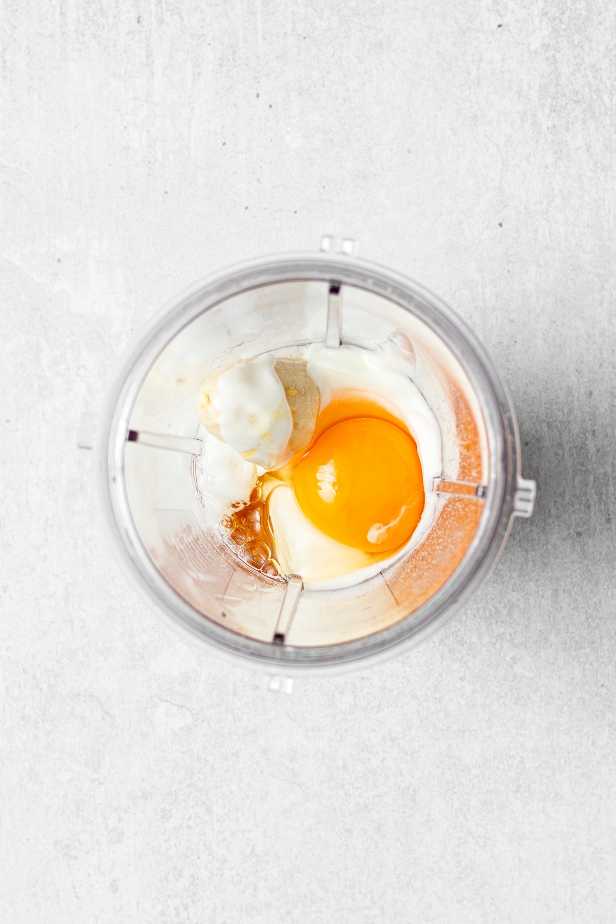 all ingredients for the chocolate chip baked oats dough in a blender