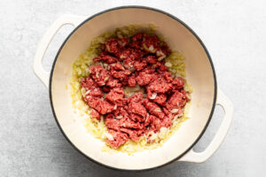 sautéed aromatics and ground beef in a pot