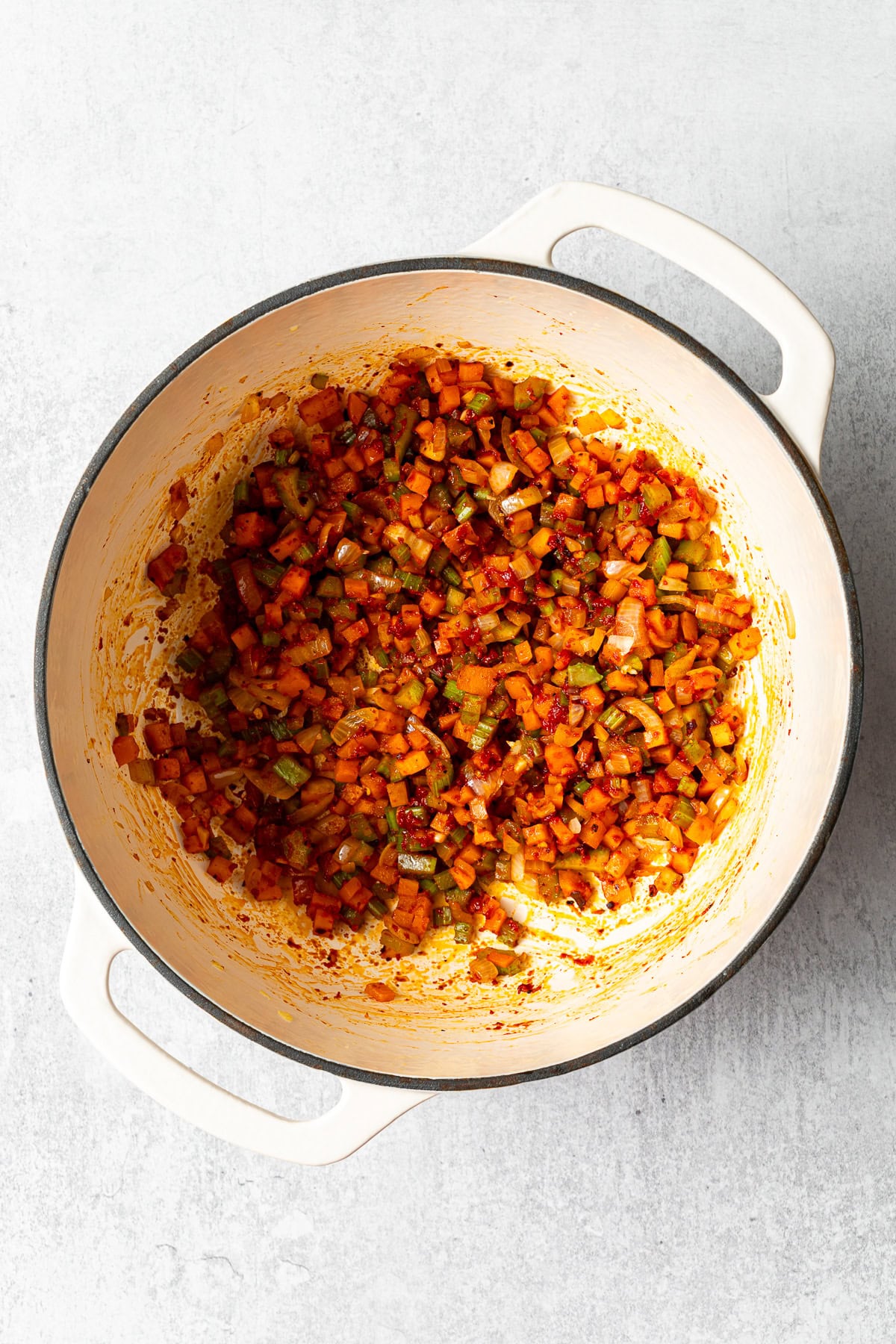vegetables sautéed with tomato paste and all of the seasonings in a large pot